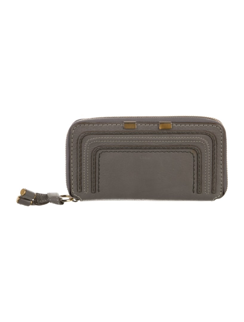 Chloe Grey Leather Tassel Exp Zip Conti Wallet: Condition is: very good, pre-owned. Details: grey leather, gold-tone hardware, tassel accents, canvas lining & three interior pockets with card slots, exposed zip closure, height: 4", width: 7. 25", d