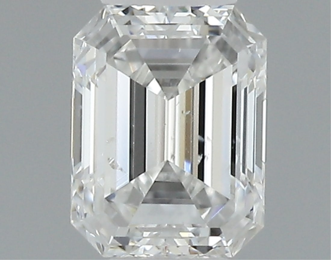 Gia Certified Emerald Cut .30ct Si2 Diamond: This gia-certified natural emerald-cut diamond weighs 0. 30 carats and features f color grade with si2 clarity. It has an excellent polish and very good symmetry with no fluorescence. This diamond has