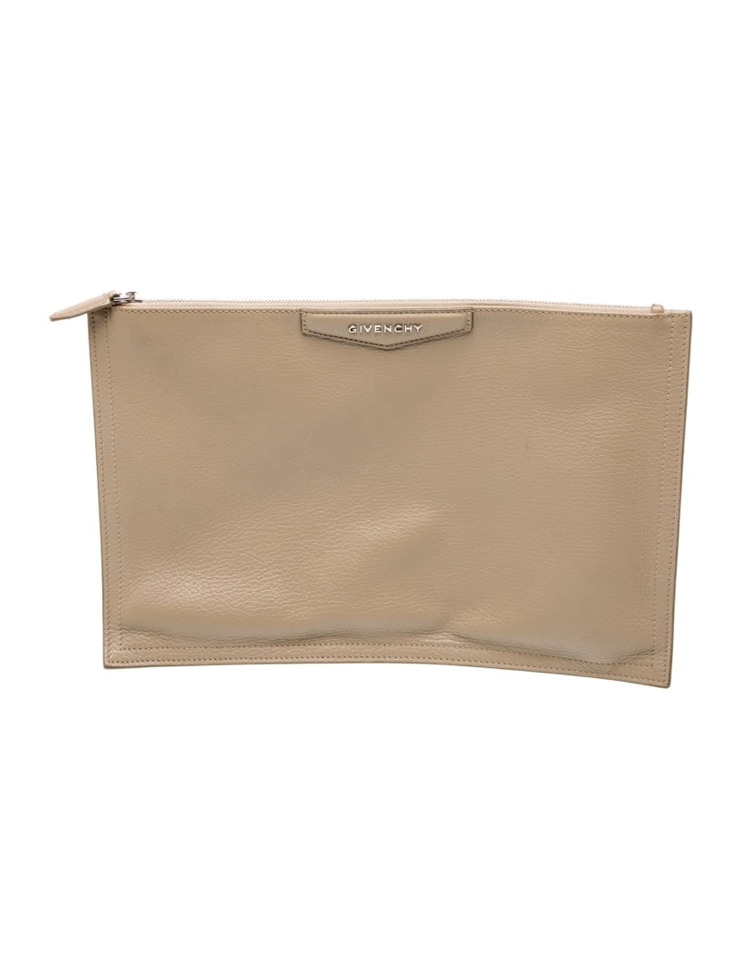 Givenchy Neutrals Leather Zip Closure Clutch: Condition is: good, pre-owned. Details: neutrals leather, silver-tone hardware, suede lining & single interior pocket, zip closure at top, height: 9", width: 13. 5", depth: 0. 5", gender: women. Condi