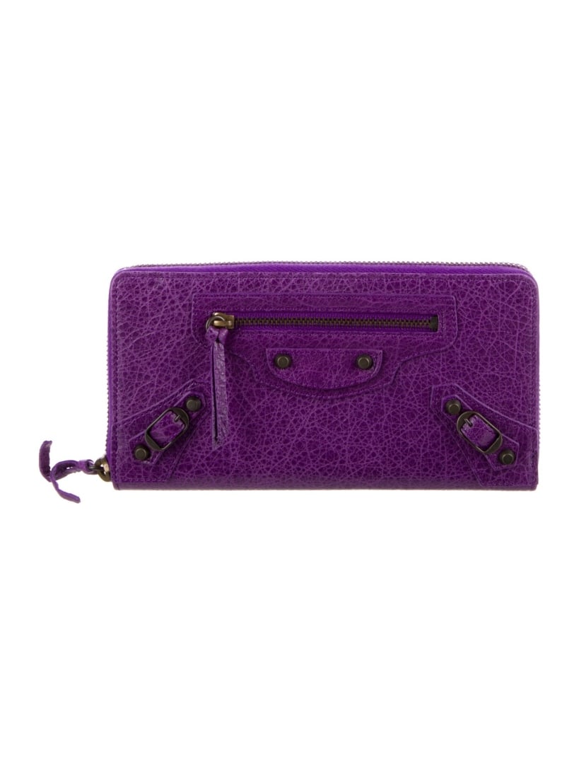 Balenciaga 2013 Purple Calfskin Zip Cont. Wallet: Condition is pristine, pre-owned. Details: from the fall/winter 2013 collection by alexander wang, purple calfskin, gunmetal hardware, single exterior pocket, canvas lining & single interior pocket wi