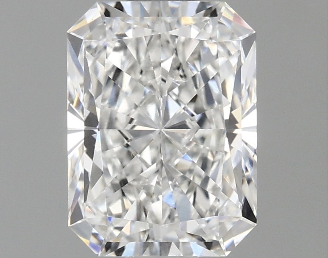 Igi Certified Radiant Cut .98ct Vvs2 Lab Diamond: This igi-certified lab-grown radiant-cut diamond weighs 0. 98 carats and boasts a stunning d color grade with vvs2 clarity. It features an excellent polish and excellent symmetry, ensuring a brilliant