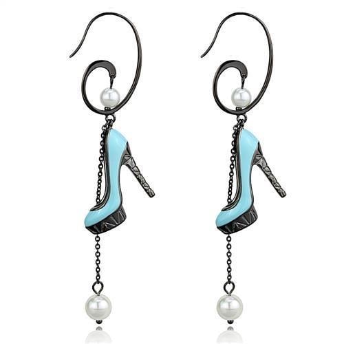 Playful Stiletto Pearl Dangle Earrings: Made with stainless steel with a gunmetal (dark grey) ion plating finish. Has a unique stiletto design. Believed to be synthetic pearl. Weight (approx): 15. 90 (g)