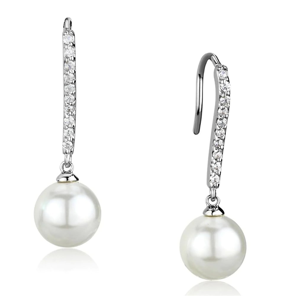 Fancy .10ct White Topaz & Pearl Drop Earrings: Weight: 2. 70 (g). A beautiful piece, features a rhodium finish brass earrings with white pearl imbued with white topaz. A must have to your collection or gift for your loved ones! Made with brass. Rh
