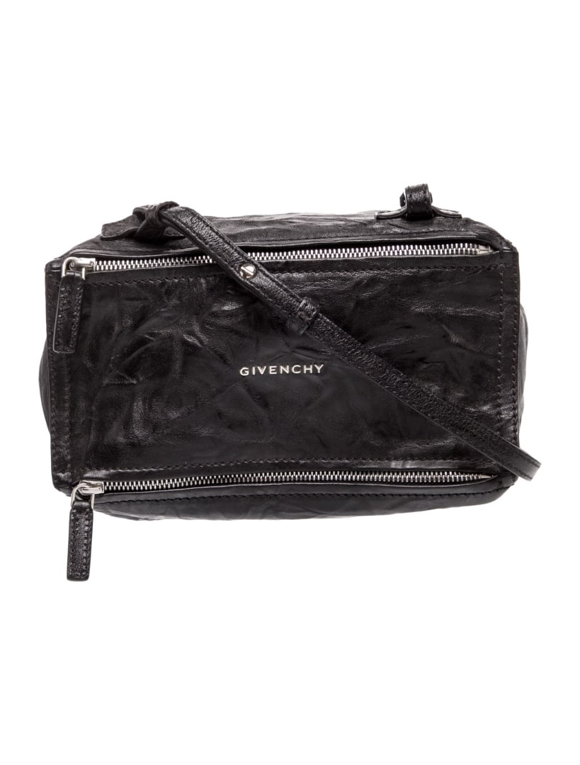 Givenchy Leather Silver-tone Hdw Crossbody Bag: Condition is very good, pre-owned. Details: black leather, silver-tone hardware, single adjustable shoulder strap, canvas lining & single interior pocket, zip closure at top, includes dust bag, should