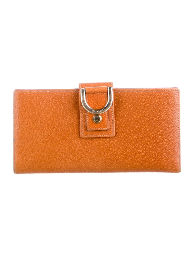 Gucci Brown Leather Gg Canvas Snap Cls Wallet: Condition is very good, pre-owned. Details: brown leather, gg canvas, gold-tone hardware, canvas lining & four interior pockets with card slots, snap closure, height: 3. 75", width: 7. 5", depth: 0. 5