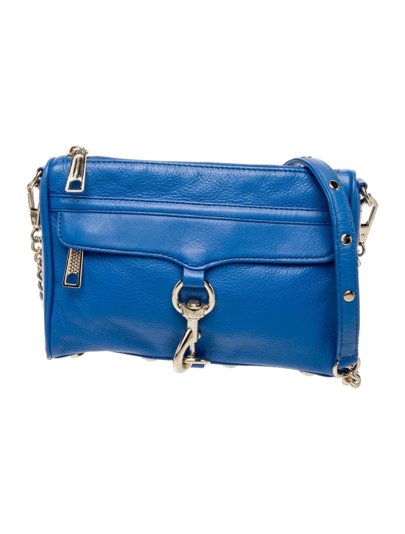 Rebecca Minkoff Blue Lthr Chain-link Crossbody Bag: Condition is very good, pre-owned. Details: blue leather, gold-tone hardware, chain-link shoulder strap, chain-link accents & canvas lining & single interior pocket, zip closure at top, protective fee