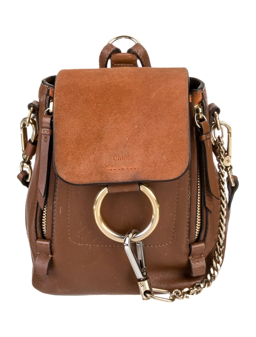 Chloe Brown Leather Chain-link Snap Backpack: Condition is good, pre-owned. Details: brown leather, gold-tone hardware, suede trim, flat handle & dual adjustable shoulder straps, chain-link accents, canvas lining & single interior pocket, snap cl