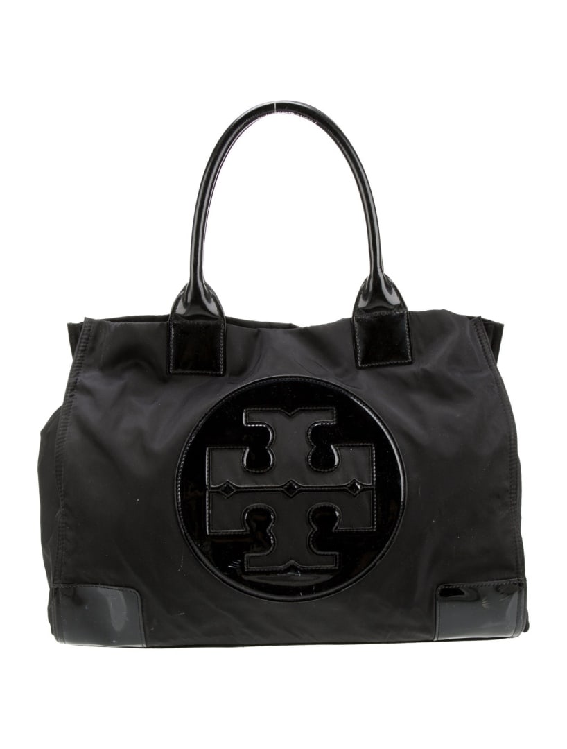 Tory Burch Patent Leather Black Nylon Snap Tote: Condition is good, pre-owned. Details: black nylon, signature logo, gold-tone hardware, patent leather trim, rolled handles & dual shoulder straps, leather trim embellishment, canvas lining & three in