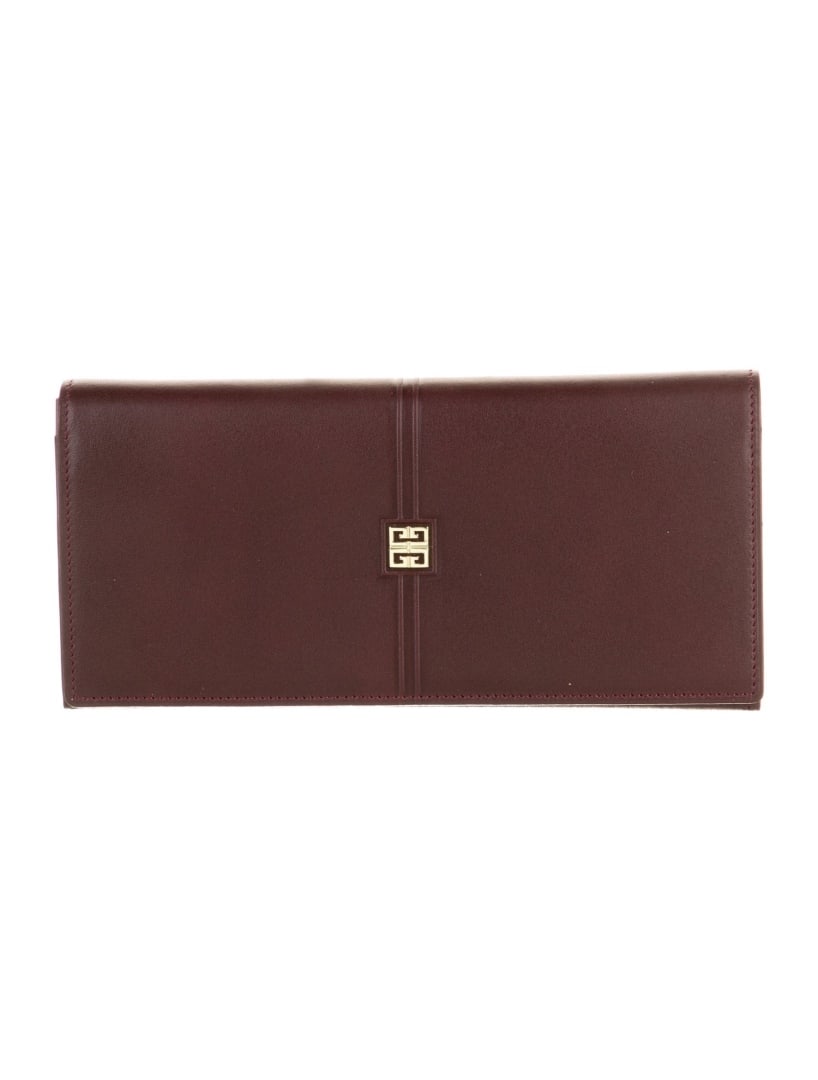Givenchy Burgundy Calfskin Flap Cont. Wallet: Condition is very good, pre-owned. Details: burgundy calfskin, signature logo, gold-tone hardware, canvas lining & single interior pocket with card slots, flap closure, includes box & dust bag, height