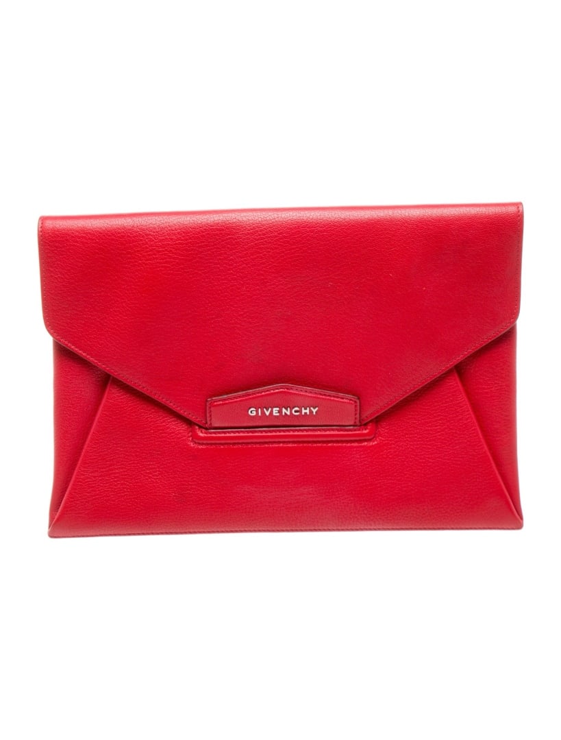 Givenchy Red Leather Fold-in Flap Clutch: Condition is good, pre-owned. Details: red leather, silver-tone hardware, canvas lining & single interior pocket, fold-in flap closure at front, height: 8. 5", width: 12. 25", depth: 0. 75", gender: w