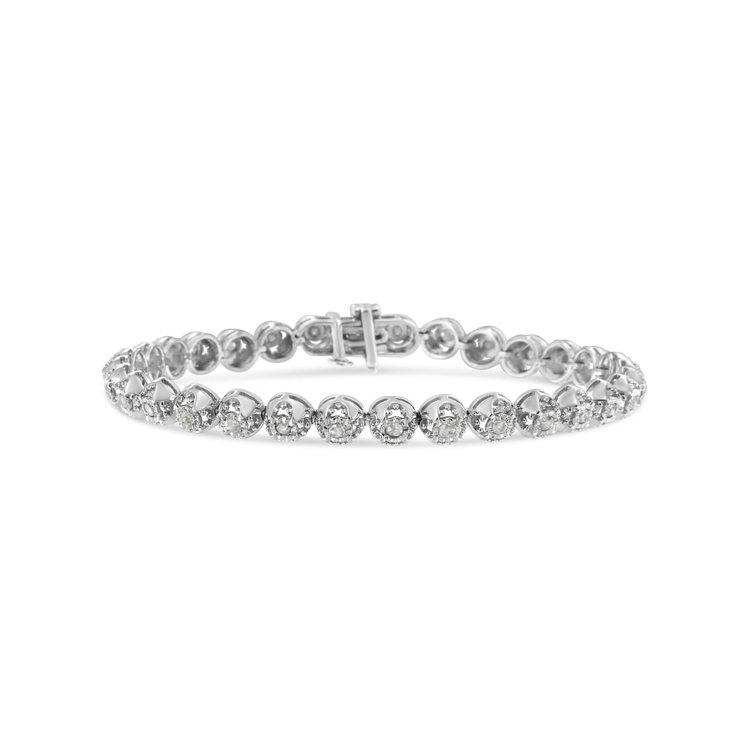 Elegant 1.00ct Diamond Quatrefoil Flower Bracelet: Length: 7". Adorned with 32 natural round diamonds totaling 1. 00 carat. Each diamond is meticulously secured in a prong setting, allowing their natural radiance to shine through. With an approximate