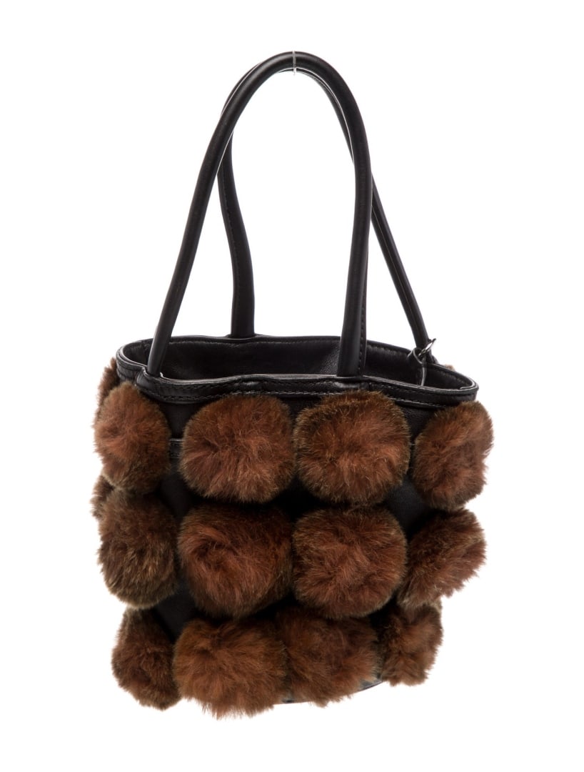 Alexander Wang Black Leather Top Handle Bag: Condition is good, pre-owned. Details: black leather, silver-tone hardware, rolled handles, leather lining, open top, protective feet at base, handle drop: 6. 25", height: 6. 75", width: 9", depth: 3.