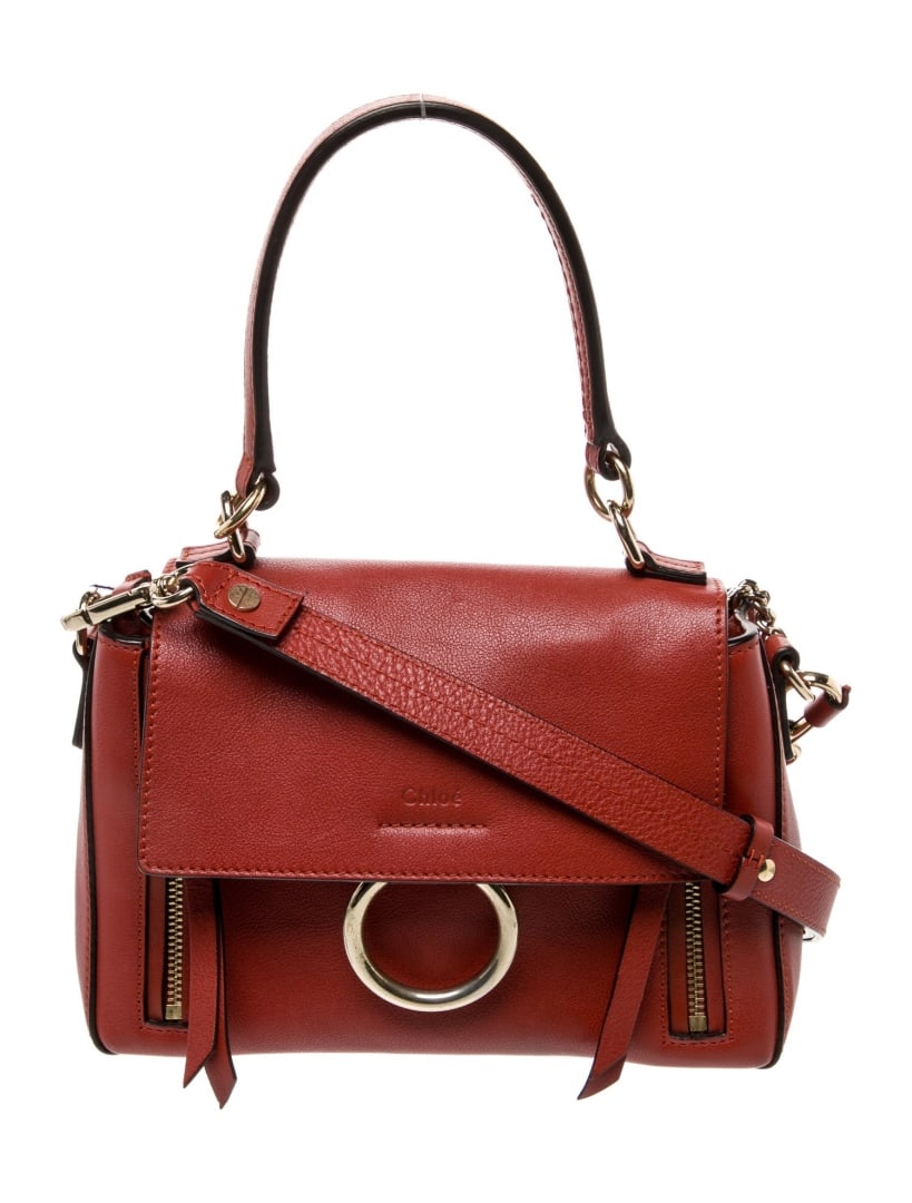 Chloe Red Leather Chain-link Top Handle Bag: Condition is very good, pre-owned. Details: red leather, multitonal hardware, flat handle & single adjustable shoulder strap, chain-link accents & canvas lining & single interior pocket, flap closure