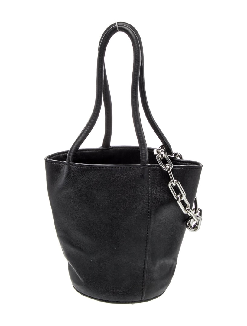 Alexander Wang Blk Leather Chain-link Top Hdl Bag: Condition is good, pre-owned. Details: black leather, silver-tone hardware, rolled handles, chain-link accents, leather lining with card slots, open top, protective feet at base, handle drop: 5. 75",