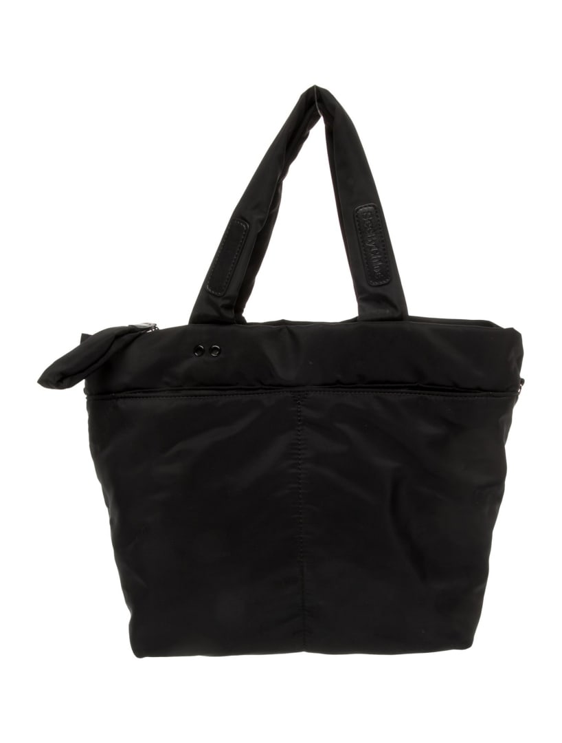 See By Chloe Black Nylon Zip Cls Weekender Bag: Condition is very good, pre-owned. Details: black nylon, silver-tone hardware, rolled handles & single shoulder strap, leather trim embellishment, nylon lining & three interior pockets, zip closure at