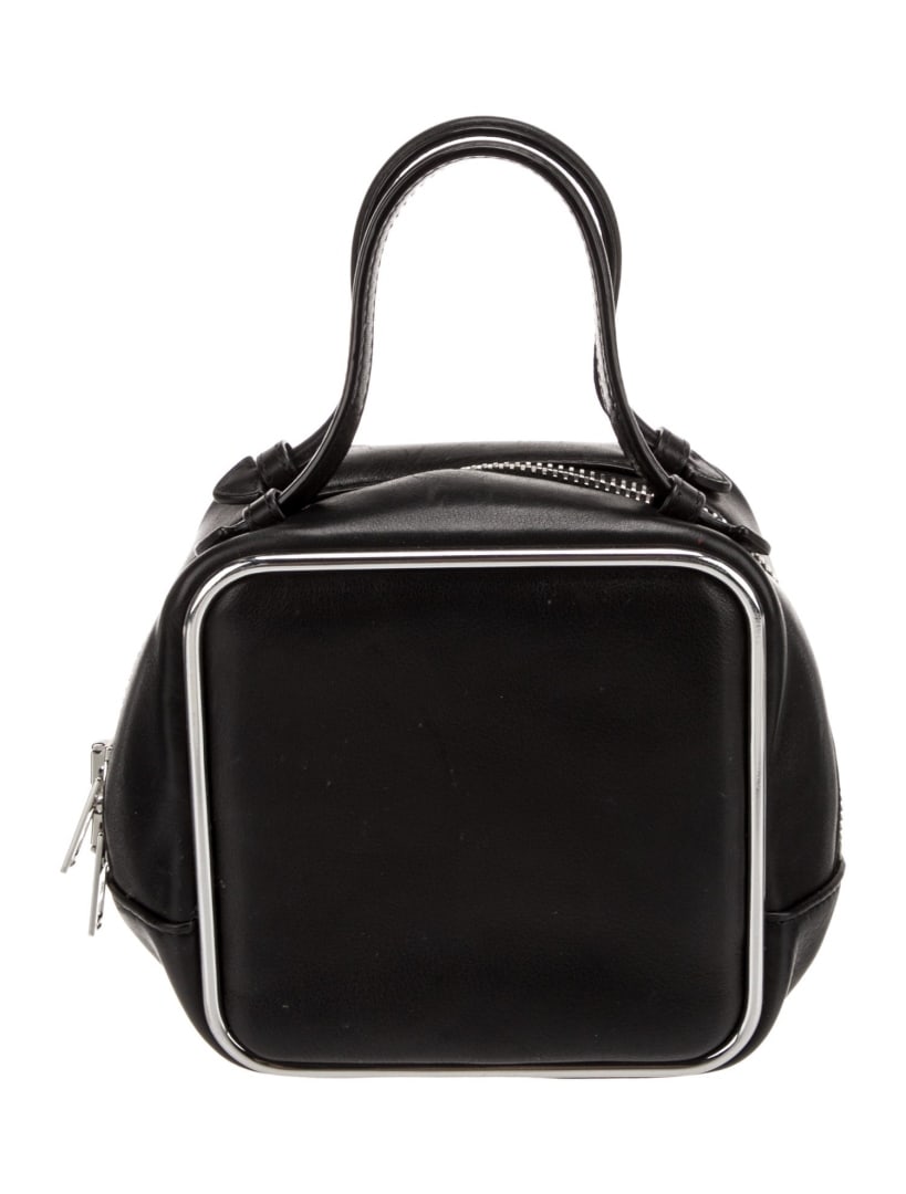 Alexander Wang Blk Leather Zip Closure Top Hdl Bag: Condition is: very good, pre-owned. Details: black leather, silver-tone hardware, flat handles, nylon lining & single interior pocket, zip closure at top, handle drop: 3. 5", height: 6. 25", width: 6.