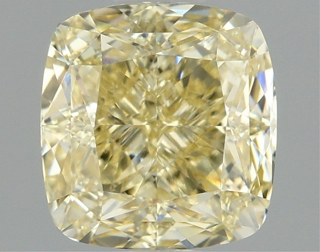 Fancy Yellow Cushion Cut 1.59ct Vvs2 Lab Diamond: This igi-certified lab-grown cushion-cut diamond weighs 1. 59 carats and features a stunning fancy intense yellow color with vvs2 clarity. It boasts an excellent polish and excellent symmetry with no