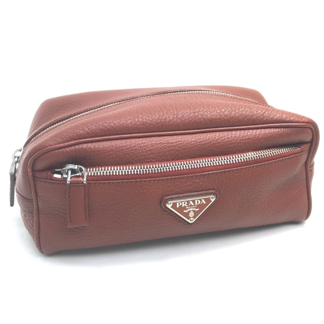 Prada Red Vitello Daino Medium Pouch: Condition is very good, pre-owned. Details - condition details: some very light signs of wear like light marks, scratches or creasing. Size and fit: 9. 05"w x 4. 33"h x 4. 33"d, 13-23. 5" strap drop.