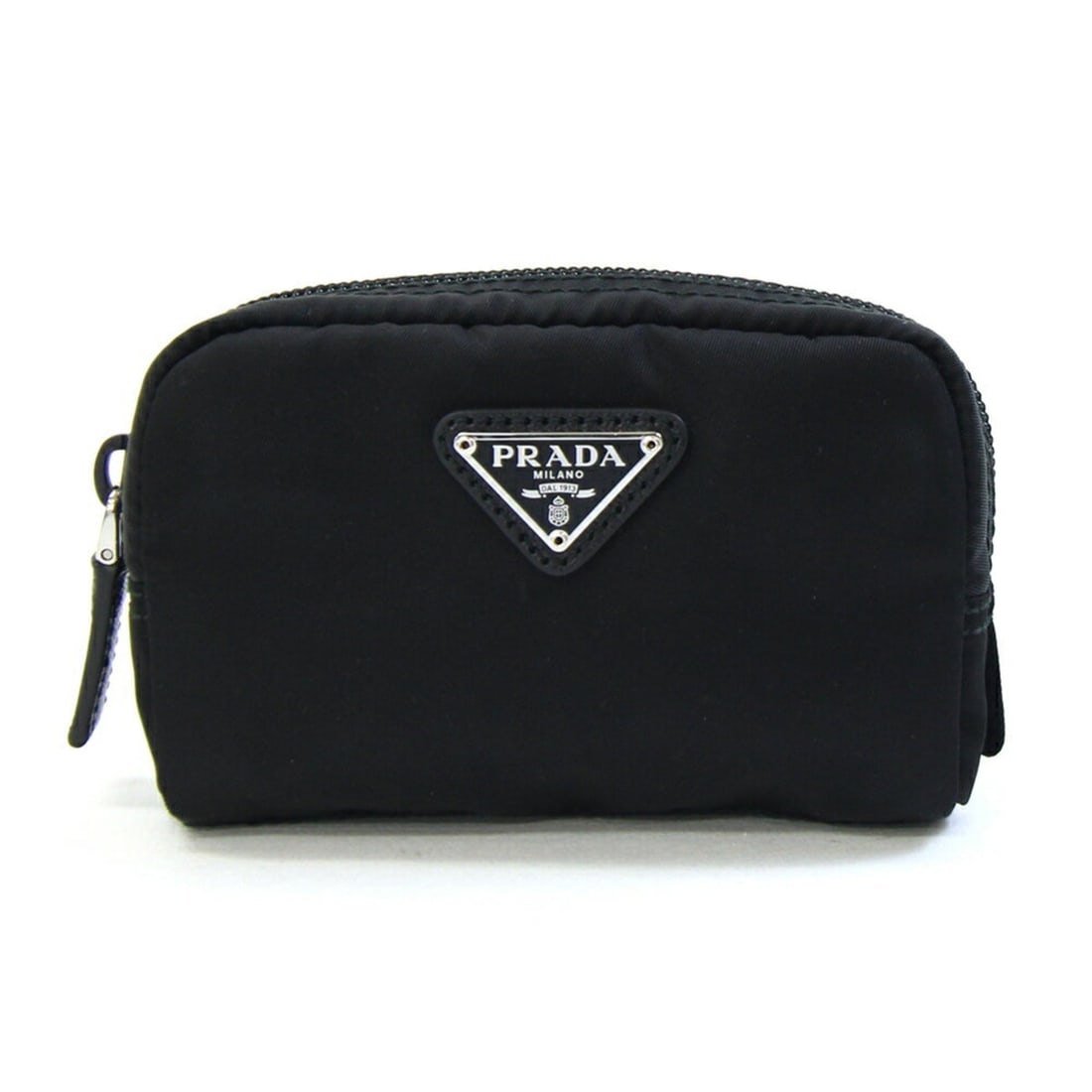 Prada Black Tessuto Pouch: Condition is great, pre-owned. Details - condition details - condition details: some very light signs of wear like light marks, scratches or creasing. Size and fit: 8. 0"w x 6. 0"h x 2. 5"d, 7-15" str