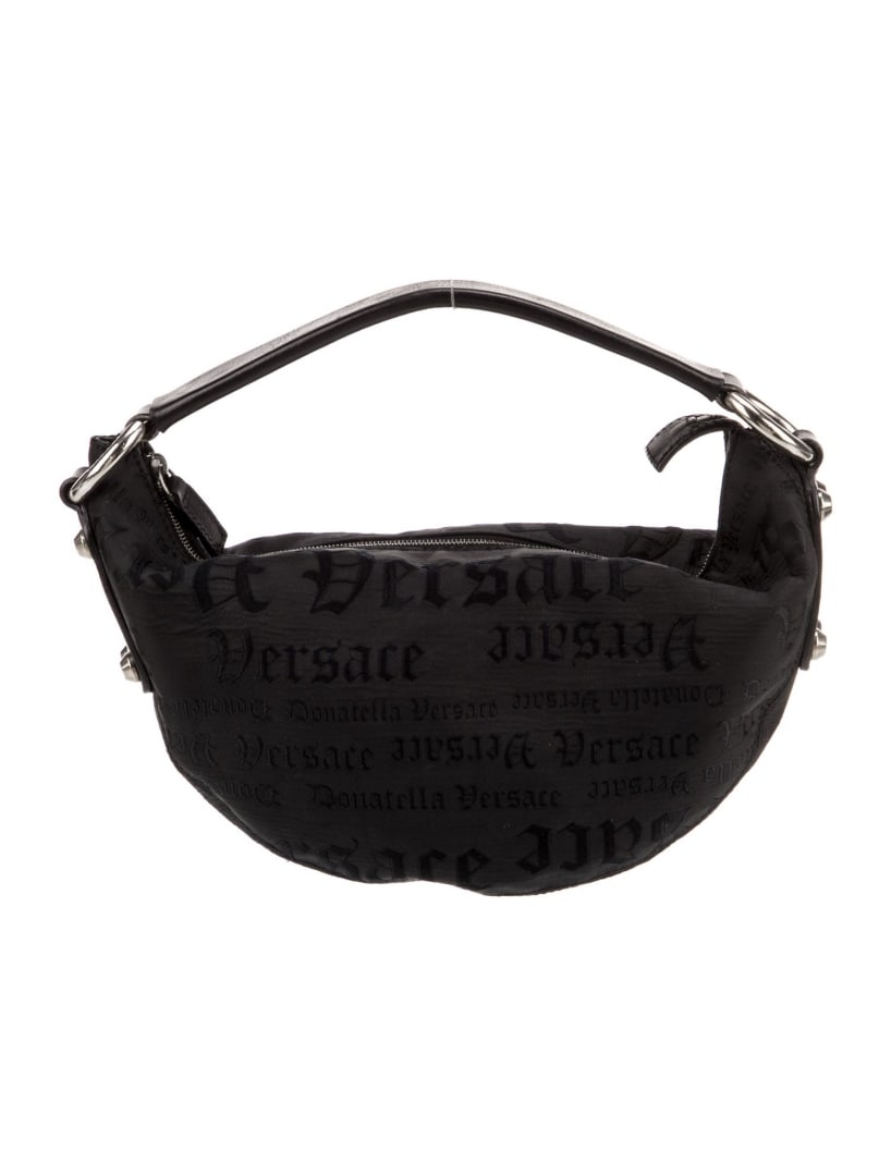 Versace Black Nylon Silver-tone Hdw Top Hdl Bag: Condition is very good, pre-owned. Details: black nylon, printed, silver-tone hardware, leather trim, flat handle & single shoulder strap, leather trim embellishment, satin lining, zip closure at top,