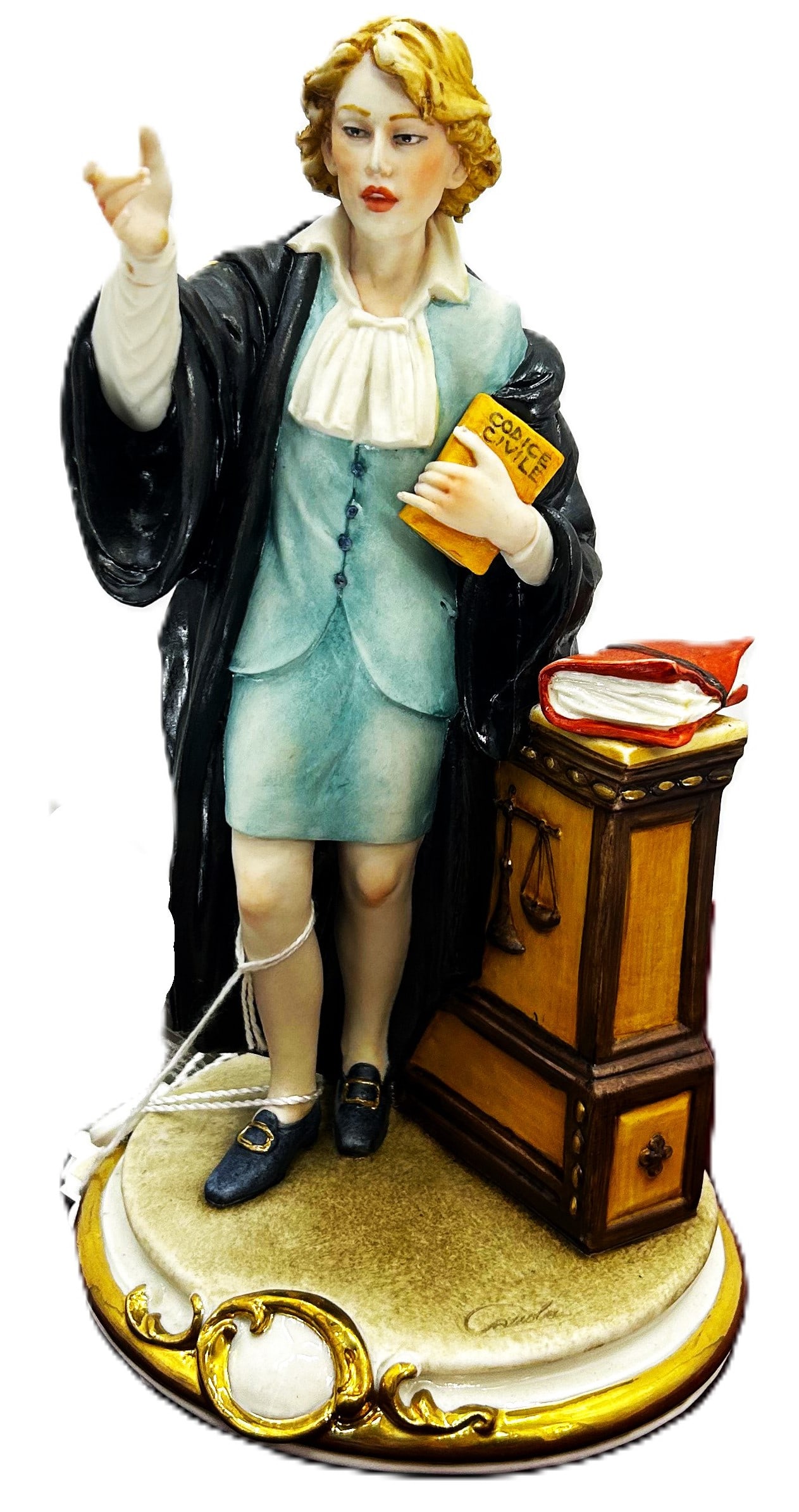 Capodimonte Porcelain Figurine: The Lawyer: This detailed Capodimonte porcelain figurine depicts a lawyer in their judicial robes. The figure is holding a book titled "CODICE CIVILE" (Civil Code) and appears to be in the midst of a presentation