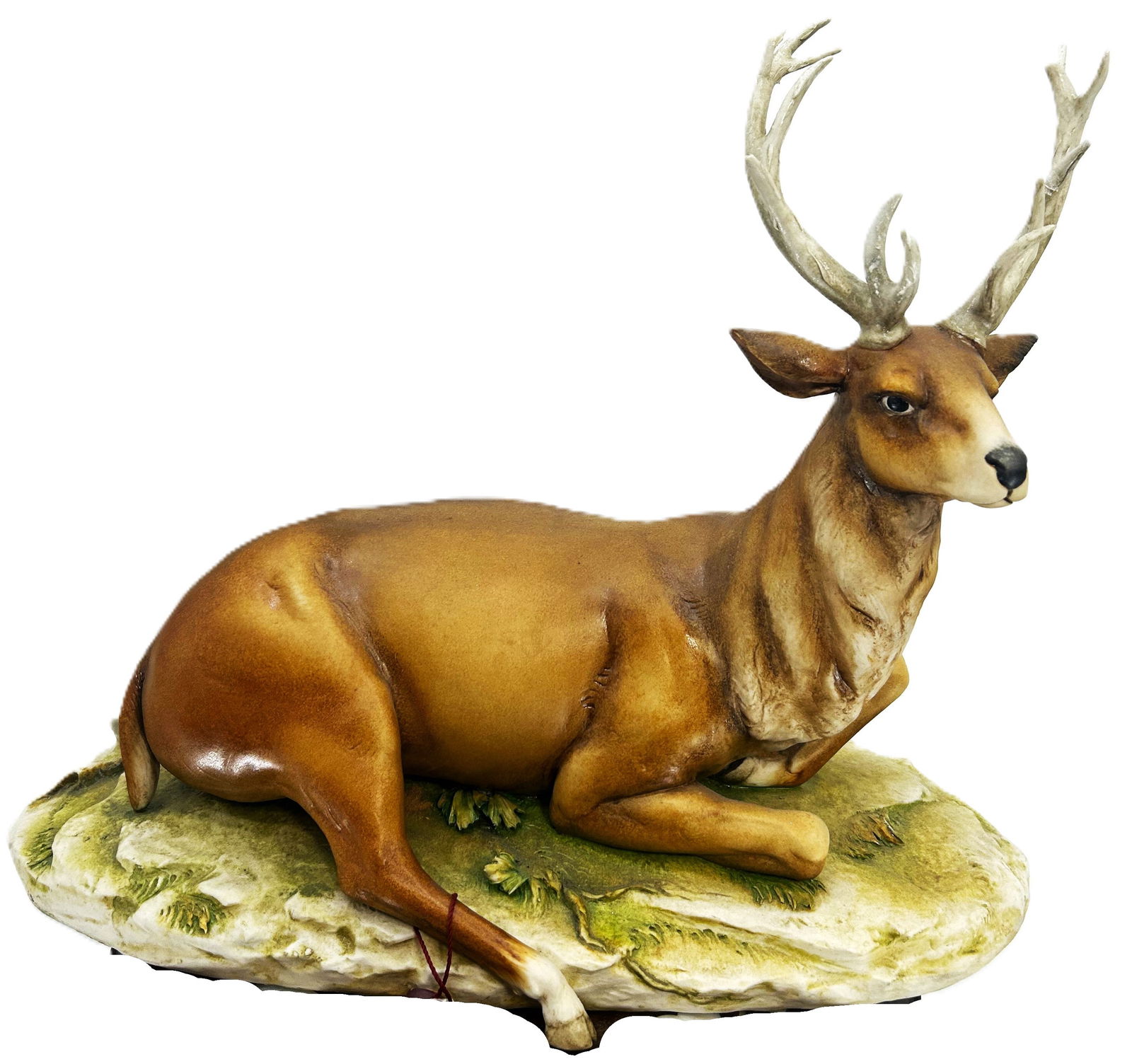 Wild deer sitting: Italian capodimonte sculpture. A wild deer sitting in the forest a beautiful capture of wilderness.