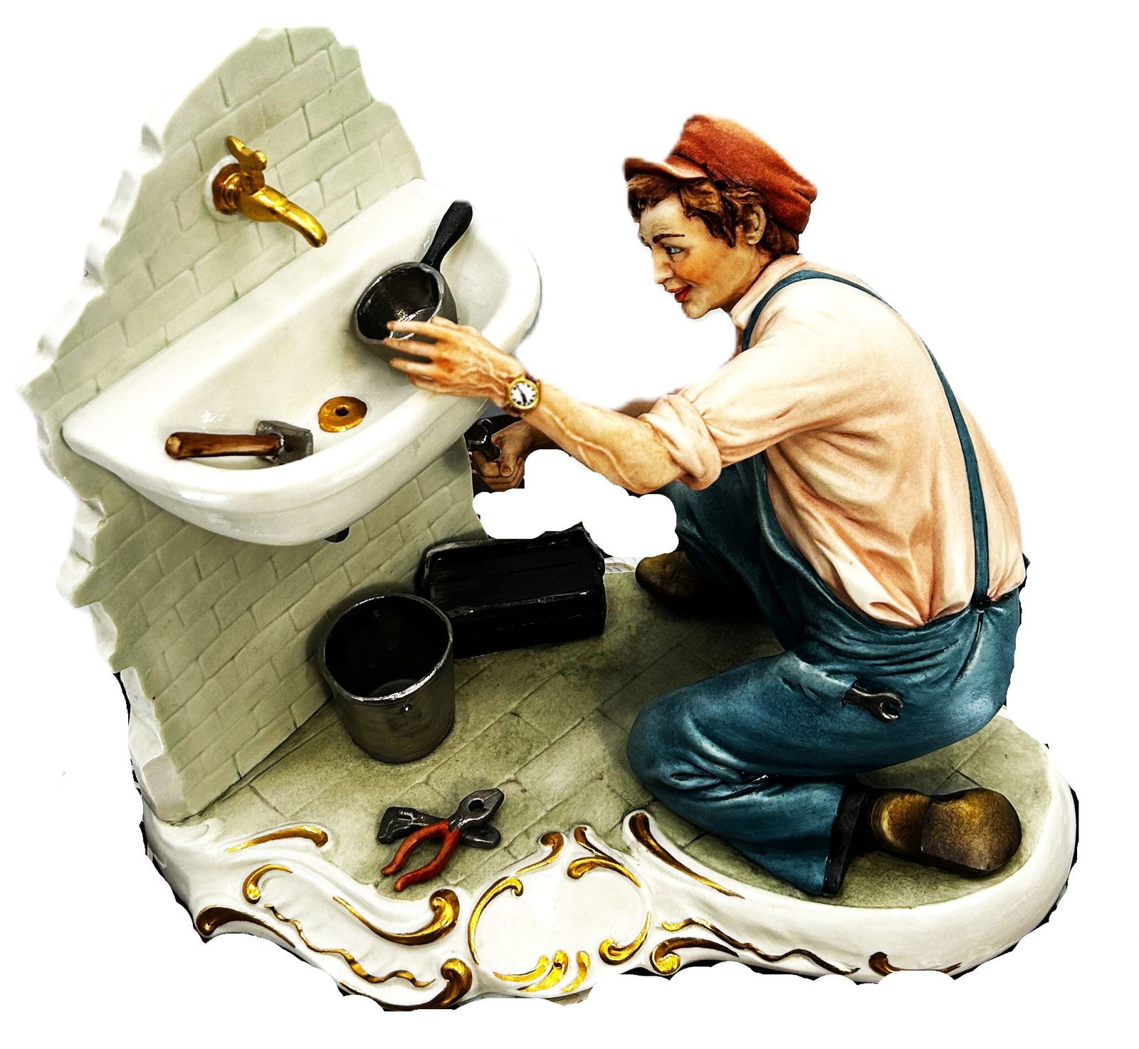 Plumber at Work: his is a Capodimonte figurine depicting a plumber hard at work, repairing a sink against a backdrop of a half-demolished wall.