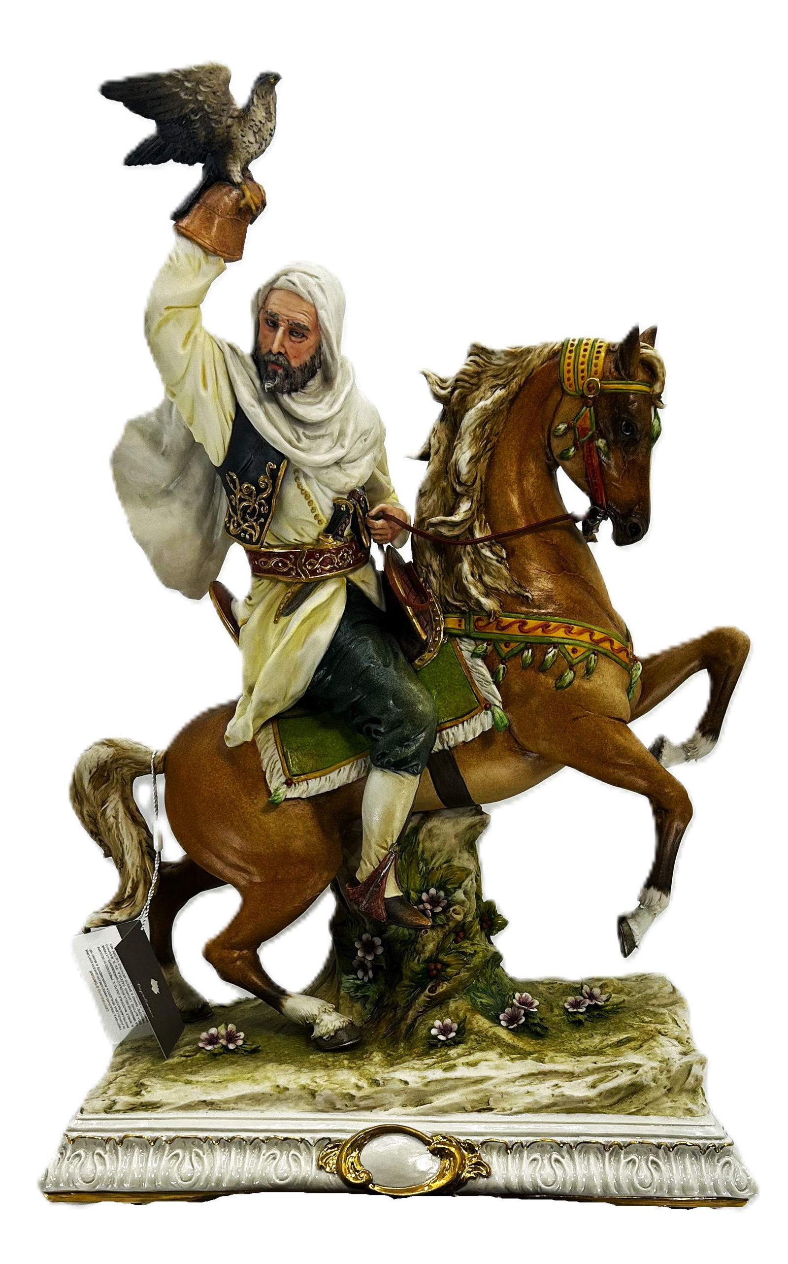 Capodimonte Falconer on Horseback: A majestic Capodimonte porcelain figurine depicting a noble falconer mounted on a rearing horse.