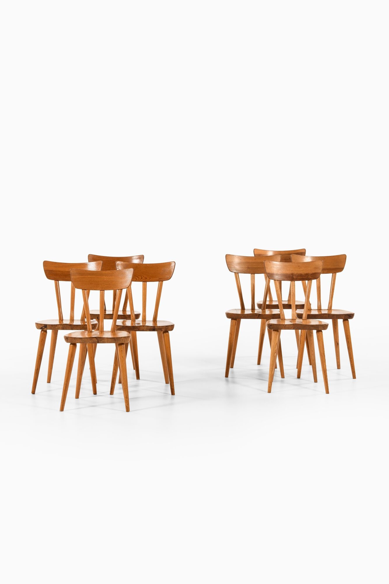 Goran Malmvall Set of eight dining chairs: GÖRAN MALMVALL, Set of eight dining chairs. Karl Andersson & Söner, Sweden, 1940s. Solid pine. 40.5 x 42 x 81.5 cm. Seat Height: 44 cm - Göran Malmvall (1917–2001) was the youngest son of Karl An