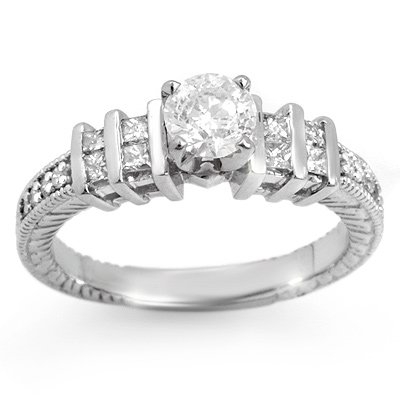 Solitaire 1.00ctw ACA Certified Diamond Ladies Ring: Lot no.: 1753 GENUINE 1.00 ctw DIAMOND SOLITAIRE ENGAGEMENT / ANNIVERSARY LADIES RING IN 14KT WHITE GOLDCENTER DIAMOND: 1 ROUND CUT 0.56 ctwDIAMOND ACCENT: 16 ROUND CUT 0.44 ctwCLARITY: SI3-I2COLOR: H