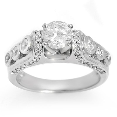 Solitaire 1.75ctw ACA Certified Diamond Bridal Ring: Lot no.: 1921 DIAMOND 1.75 ctw ENGAGEMENT SOLITAIRE RING 14KT WHITE GOLDCENTER DIAMOND: 1 ROUND CUT 0.97ctwACCENT DIAMOND: 44 ROUND CUT 0.78 ctwCLARITY: SI2-I1COLOR: H-KGOLD WEIGHT: APPROXIMATELY 6.90