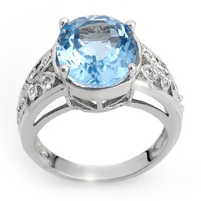 Famous 7.15ctw ACA Certified Diamond & Blue Topaz Ring: Lot no.: 1170 VINTAGE STYLE 7.15ctw BLUE TOPAZ & DIAMOND RING 10KT WHITE GOLDGEMSTONE: 1 ROUND CUT BLUE TOPAZ 7.0ctw DIAMOND: 10 ROUND DIAMONDS .15 ctw CLARITY: SICOLOR: G-IGOLD WEIGHT: APPROXIMATELY 