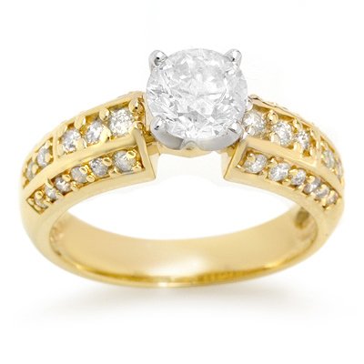 Solitaire 1.70ctw ACA Certified Diamond Ring 14K Gold: Lot no.: 1797 DIAMOND 1.70 ctw ENGAGEMENT SOLITAIRE RING TWO-TONECENTER DIAMOND: 1 ROUND CUT 1.03 ctwDIAMOND: 34 ROUND BRILLIANT CUT 0.67 ctwCLARITY: SI3COLOR: H-KGOLD WEIGHT: APPROXIMATELY 5.35 GRAMS