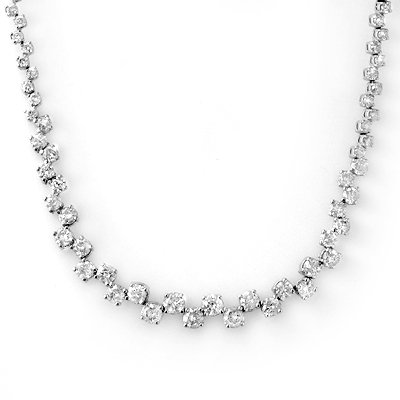 10.0ct ACA Certified Diamond Necklace 14K White Gold: Lot no.: 1986 GENUINE 10.0 ctw DIAMOND TENNIS NECKLACE IN 14KT WHITE GOLDDIAMOND: 136 ROUND IDEAL CUT 10.0 ctwCLARITY: SI3-I2COLOR: H-KGOLD: APPROXIMATELY 27.0 GRAMSDIMENSIONS: APPROX. 15 3/4" x 1/4"