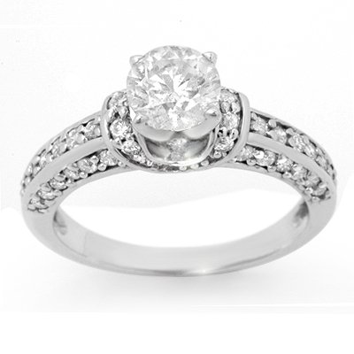 Solitaire 1.60ctw ACA Certified Diamond Bridal Ring: Lot no.: 1906 DIAMOND 1.60 ctw ENGAGEMENT SOLITAIRE RING WHITE GOLDCENTER DIAMOND: 1 ROUND CUT 0.90ctwDIAMOND: 44 ROUND CUT 0.70 ctwCLARITY: SI3COLOR: H-KGOLD WEIGHT: APPROXIMATELY 4.70 GRAMSSIZE: 6 3