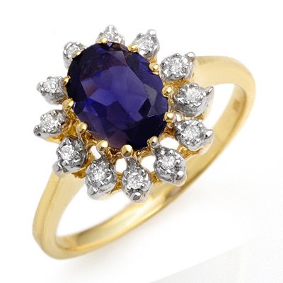 1.22ctw Diamond & Iolite Ring Yellow Gold: Lot no.: 1911 GENUINE 1.22 ctw DIAMOND & IOLITE LADIES RING IN 10K YELLOW GOLDGEMSTONE: 1 OVAL CUT IOLITE 1.10 ctwDIAMOND: 12 ROUND CUT 0.12 ctw CLARITY: SI3-I2COLOR: H-KGOLD WEIGHT: APPROXIMATELY 3.0