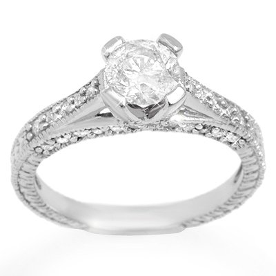 Solitaire 1.50ctw ACA Certified Diamond Ring 14K Gold: Lot no.: 1821 VINTAGE STYLE 1.50 ctw DIAMOND ENGAGEMENT RING IN 14KT WHITE GOLDCENTER DIAMOND: 1 ROUND CUT 0.92 ctwDIAMOND ACCENT: 38 ROUND CUT 0.58 ctwCLARITY: SI3-I2COLOR: H-KGOLD WEIGHT: APPROXIMAT