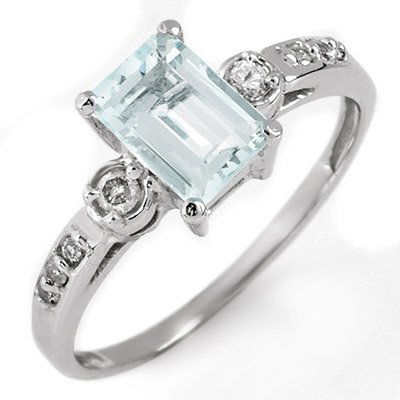 Fine 1.20ctw ACA Certified Diamond & Aquamarine Ring: Lot no.: 1754 VINTAGE STYLE 1.20 ctw DIAMOND & AQUAMARINE LADIES RING IN 10K WHITE GOLDGEMSTONE: 1 EMERALD CUT AQUAMARINE 1.00 ctwDIAMOND: 8 ROUND CUT 0.20 ctwCLARITY: SI3-I2COLOR: H-KGOLD WEIGHT: APP