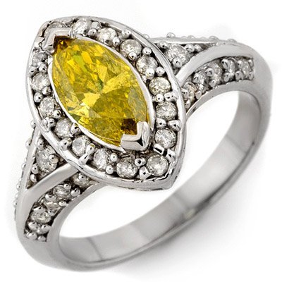 Ring 1.72ct ACA Certified White & Canary Yellow Diamond: Lot no.: 1998 ANTIQUE STYLE 1.72 ctw WHITE & CANARY YELLOW DIAMOND LADIES RING IN 14K GOLDCENTERSTONE: 1 MARQUISE CUT CANARY YELLOW DIAMOND 1.07 ctwDIAMOND: 38 ROUND CUT 0.65 ctwCLARITY: SI3-I2COLOR: 