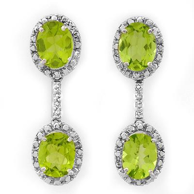 ACA Certified 8.10ctw Diamond & Peridot Earrings Gold: Lot no.: 1160 ANTIQUE STYLE 8.10 ctw DIAMOND & PERIDOT LADIES EARRINGS IN 10K WHITE GOLDGEMSTONE: 4 OVAL CUT PERIDOT 8.00 ctwDIAMOND: 8 ROUND CUT 0.10 ctwCLARITY: SI3-I2COLOR: H-KGOLD WEIGHT: APPROXIM