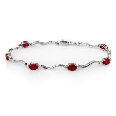 ACA Certified 4.02ctw Diamond & Ruby Bracelet Gold: Lot no.: 1486 VINTAGE STYLE 4.02 ctw DIAMOND & RUBY BRACELET SET IN 10KT WHITE GOLDGEMSTONE: 6 OVAL CUT RUBY 4.00 ctw DIAMOND: 2 ROUND CUT .02 ctw CLARITY: SI3-I2COLOR: H-KGOLD WEIGHT: APPROXIMATELY 4