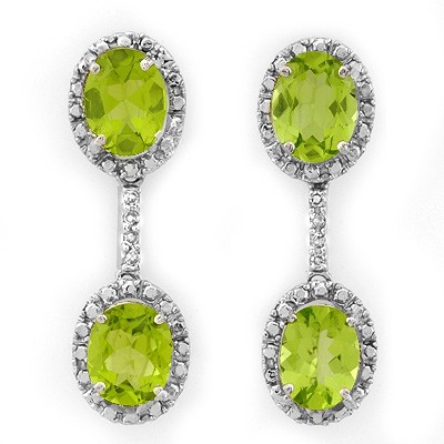 ACA Certified 8.10ctw Diamond & Peridot Earrings Gold: Lot no.: 1160 ANTIQUE STYLE 8.10 ctw DIAMOND & PERIDOT LADIES EARRINGS IN 10K WHITE GOLDGEMSTONE: 4 OVAL CUT PERIDOT 8.00 ctwDIAMOND: 8 ROUND CUT 0.10 ctwCLARITY: SI3-I2COLOR: H-KGOLD WEIGHT: APPROXIM