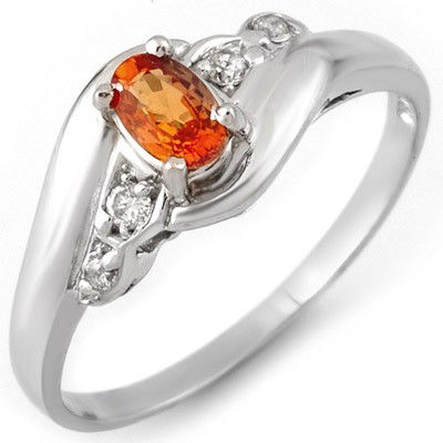 Genuine 0.42ctw Orange Sapphire & Diamond Ring 10K Gold: Diamond: 4 Round cut @ 0.09 ctw Clarity: SI-I Color: H-KGemstone: Natural SapphireGemstone color: OrangeGemstone quality: Good-to-Very GoodGemstone Cut & Weight: 1 Oval cut @ 0.33 ctwMetal Purity & Co