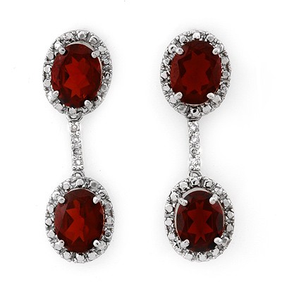 Genuine 8.10 ctw Garnet & Diamond Earrings White Gold: Diamond: 8 Round cut @ 0.10 ctw Clarity: SI-I Color: H-KGemstone: Natural GarnetGemstone color: RedGemstone quality: Good-to-Very GoodGemstone Cut & Weight: 4 Oval cut @ 8.0 ctwMetal Purity & Color : 
