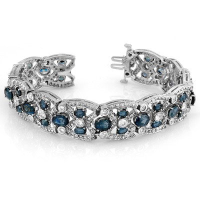 Genuine 33.0 ctw Blue Sapphire & Diamond Bracelet Gold: Diamond: 360 Round cut @ 9.0 ctw Clarity: SI-I Color: H-KGemstone: Natural SapphireGemstone color: BlueGemstone quality: Good-to-Very GoodGemstone Cut & Weight: 36 Oval cut @ 24.0 ctwMetal Purity & Co