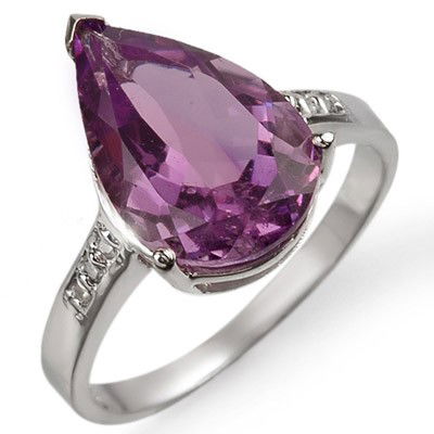 Genuine 4.10 ctw Amethyst & Diamond Ring 10K White Gold: Diamond: 6 Round cut @ 0.10 ctw Clarity: SI-I Color: H-KGemstone: Natural AmethystGemstone color: PurpleGemstone quality: Good-to-Very GoodGemstone Cut & Weight: 1 Pear cut @ 4.0 ctwMetal Purity & Col