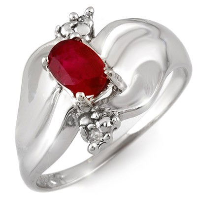 Genuine 0.79 ctw Ruby & Diamond Ring 10K White Gold: Diamond: 2 Round cut @ 0.04 ctw Clarity: SI-I Color: H-KGemstone: Natural RubyGemstone color: RedGemstone quality: Good-to-Very GoodGemstone Cut & Weight: 1 Oval cut @ 0.75 ctwMetal Purity & Color : 1