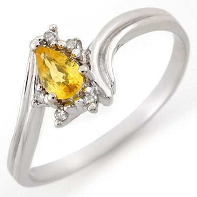 Genuine 0.35ctw Yellow Sapphire & Diamond Ring 10K Gold: Diamond: 5 Round cut @ 0.05 ctw Clarity: SI-I Color: H-KGemstone: Natural SapphireGemstone color: YellowGemstone quality: Good-to-Very GoodGemstone Cut & Weight: 1 Pear cut @ 0.30 ctwMetal Purity & Co