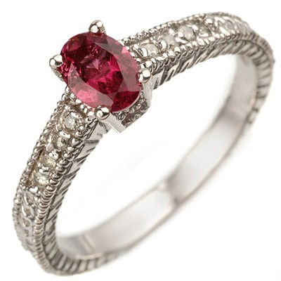 Genuine 0.66ctw Pink Tourmaline & Diamond Ring 10K Gold: Diamond: 8 Round cut @ 0.16 ctw Clarity: SI-I Color: H-KGemstone: Natural TourmalineGemstone color: PinkGemstone quality: Good-to-Very GoodGemstone Cut & Weight: 1 Oval cut @ 0.50 ctwMetal Purity & Co
