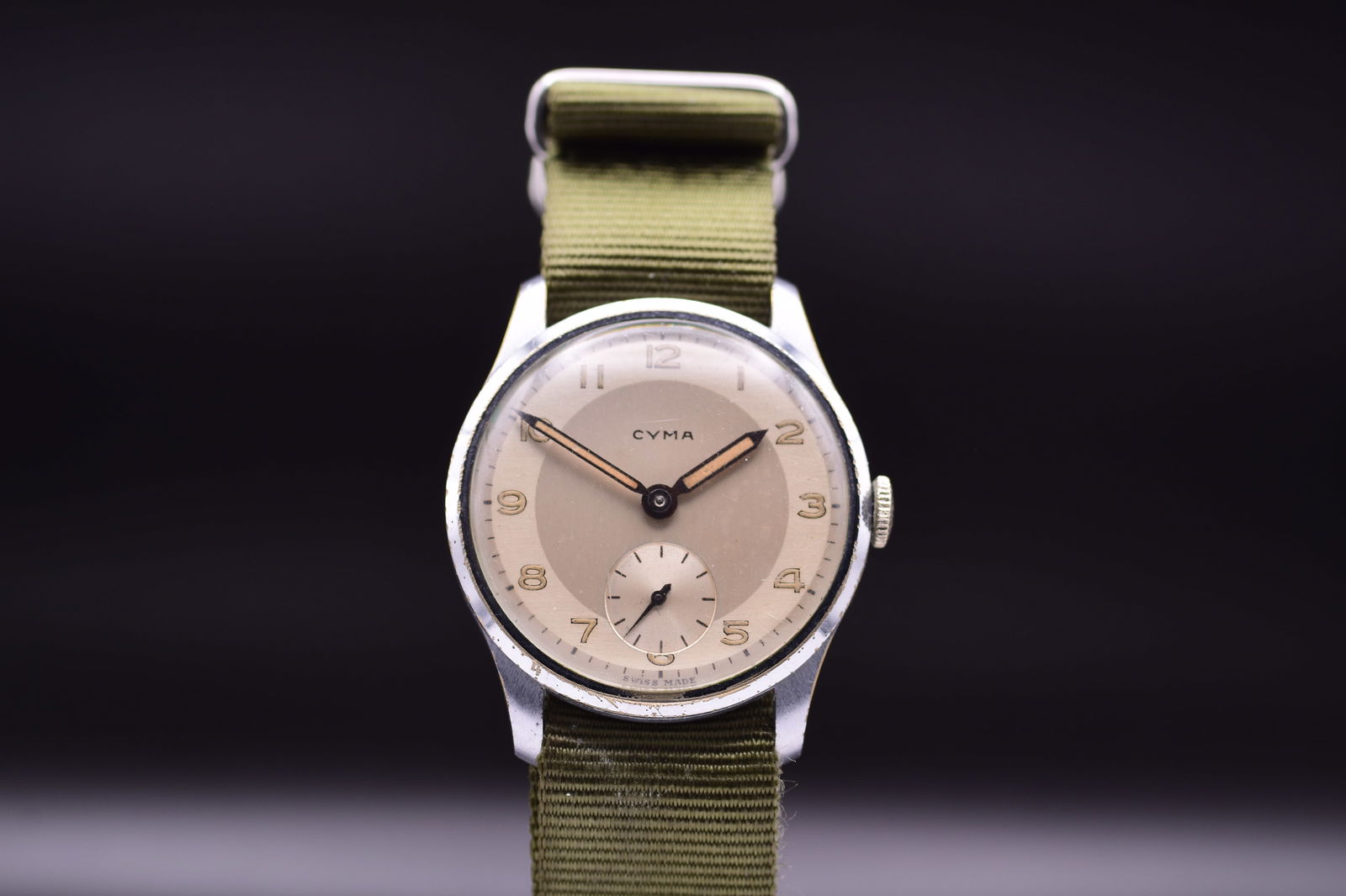 CYMA Military Era Service Style Men's Wristwatch Manual Wind c.1940: CYMA Military Era Service Style Men's Wristwatch Manual Wind c.1940 This Cyma gentleman’s wristwatch, circa 1940, perfectly captures the understated utility of the military era. Housed in a robust